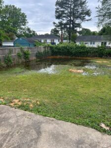 Sloped yard standing water pic